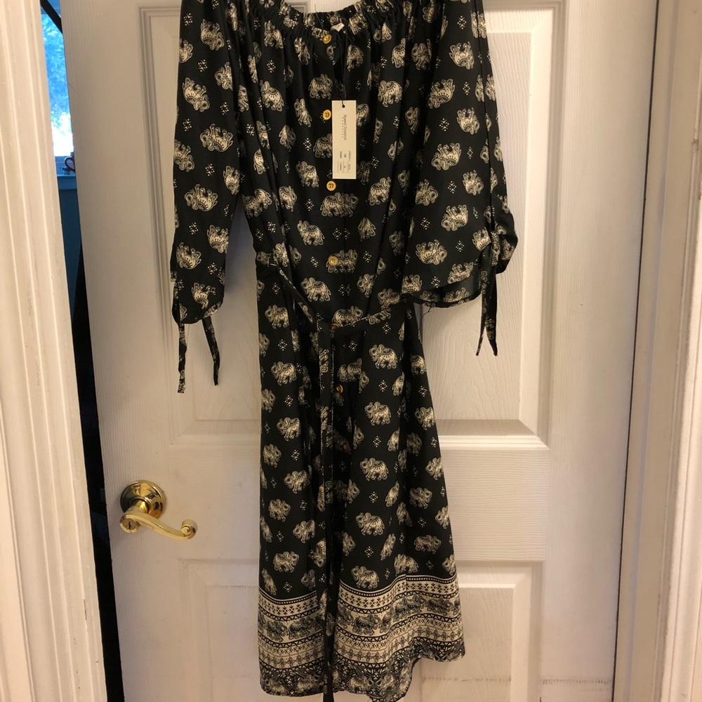Dark blue and white dress.  Has elephant print.